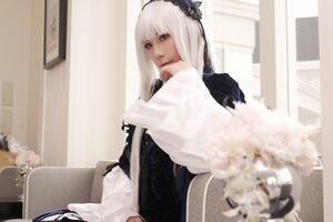 Rating: Safe Score: 0 Tags: 1girl 3d bangs blurry blurry_foreground depth_of_field dress flower hairband indoors long_hair long_sleeves looking_at_viewer sitting solo suigintou white_hair User: admin