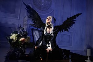 Rating: Safe Score: 0 Tags: 1girl black_dress black_wings cross dress feathered_wings feathers gothic_lolita indoors long_hair long_sleeves sitting solo suigintou wings User: admin