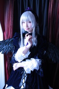 Rating: Safe Score: 0 Tags: 1girl curtains dress feathers solo suigintou white_hair wings User: admin