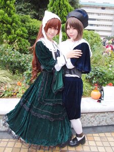 Rating: Safe Score: 0 Tags: 2girls blue_dress brown_hair dress fence flower hat long_hair looking_at_viewer multiple_cosplay multiple_girls outdoors pantyhose pavement smile standing tagme tree white_legwear User: admin