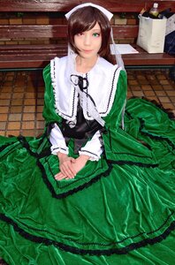 Rating: Safe Score: 0 Tags: 1girl brown_hair dress frills green_dress green_eyes heterochromia long_sleeves looking_at_viewer red_eyes short_hair sitting smile solo suiseiseki User: admin