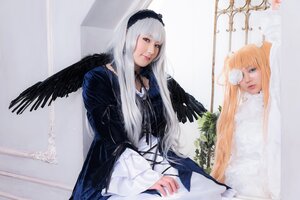 Rating: Safe Score: 0 Tags: 2girls angel angel_wings bangs bird black_wings blonde_hair dress eyepatch feathered_wings feathers gothic_lolita lips lolita_fashion long_hair long_sleeves looking_at_viewer multiple_cosplay multiple_girls suigintou tagme white_wings wings User: admin