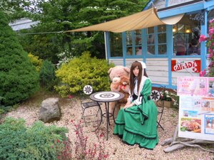 Rating: Safe Score: 0 Tags: 1girl brown_hair dress flower food green_dress long_hair outdoors sitting solo suiseiseki User: admin