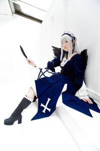 Rating: Safe Score: 0 Tags: 1girl black_footwear boots dress feathers frills full_body hairband high_heels long_sleeves silver_hair sitting solo suigintou wings User: admin