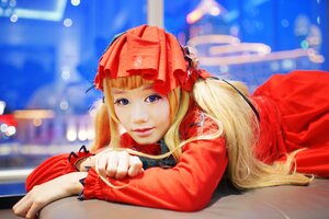 Rating: Safe Score: 0 Tags: 1girl bangs blonde_hair blue_eyes blurry blurry_background bow depth_of_field lips long_hair looking_at_viewer lying on_stomach realistic shinku smile solo User: admin
