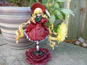 Rating: Safe Score: 0 Tags: 1girl blonde_hair blue_eyes bonnet bow cup doll dress flower frills long_hair long_sleeves looking_at_viewer red_dress shinku shoes solo teacup twintails very_long_hair User: admin