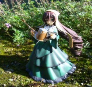 Rating: Safe Score: 0 Tags: 1girl doll dress grass green_eyes heterochromia long_hair long_sleeves nature outdoors red_eyes solo standing suiseiseki tree very_long_hair watering_can User: admin