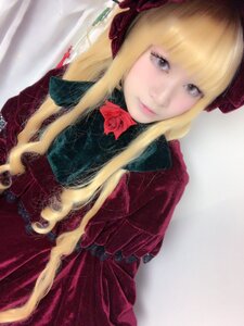 Rating: Safe Score: 0 Tags: 1girl bangs blonde_hair blue_eyes bonnet dress flower long_hair long_sleeves looking_at_viewer photo red_dress rose shinku sidelocks smile solo User: admin