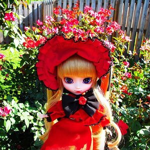 Rating: Safe Score: 0 Tags: 1girl bangs blonde_hair blue_eyes bonnet bow bowtie capelet doll dress flower long_hair looking_at_viewer outdoors plant red_capelet red_dress red_headwear rose shinku smile solo upper_body User: admin