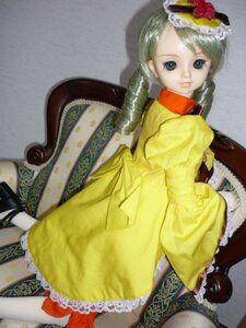 Rating: Safe Score: 0 Tags: 1girl doll dress flower frills green_eyes green_hair hat kanaria long_sleeves looking_at_viewer looking_back photo sitting solo yellow_dress User: admin