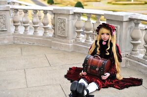 Rating: Safe Score: 0 Tags: 1girl blonde_hair blue_eyes dress gothic_lolita lolita_fashion long_hair red_dress shinku sitting solo User: admin