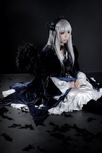 Rating: Safe Score: 0 Tags: 1girl bangs black_ribbon closed_mouth dress hair_ornament lips long_hair long_sleeves looking_at_viewer ribbon sitting solo suigintou wide_sleeves User: admin