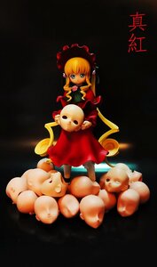 Rating: Safe Score: 0 Tags: 1girl black_background blonde_hair blue_eyes doll dress long_hair looking_at_viewer red_dress shinku solo standing stuffed_animal User: admin