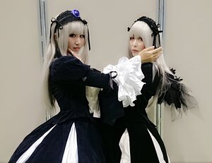 Rating: Safe Score: 0 Tags: 2girls black_dress black_ribbon closed_mouth frills hairband lips long_hair long_sleeves looking_at_viewer multiple_girls ribbon siblings silver_hair sisters solo suigintou wings User: admin