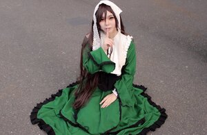 Rating: Safe Score: 0 Tags: 1girl bangs brown_hair dress green_dress long_hair long_sleeves ribbon sitting sky solo suiseiseki very_long_hair User: admin