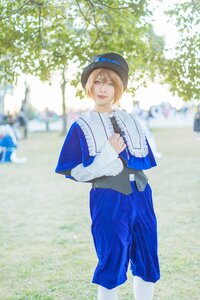 Rating: Safe Score: 0 Tags: 1girl blonde_hair blue_eyes blurry depth_of_field hat lips outdoors pants photo realistic short_hair smile solo souseiseki standing User: admin
