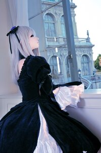 Rating: Safe Score: 0 Tags: 1girl black_dress bouquet building city dress flower frills gothic_lolita hairband long_hair long_sleeves profile solo suigintou white_hair User: admin