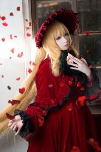 Rating: Safe Score: 0 Tags: 1girl blonde_hair blue_eyes blurry depth_of_field dress flower long_hair long_sleeves petals red_dress rose_petals shinku solo User: admin