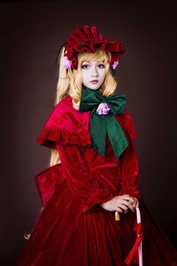 Rating: Safe Score: 0 Tags: 1girl blonde_hair blue_eyes bonnet capelet dress flower lips long_hair long_sleeves looking_at_viewer red_dress rose shinku solo standing User: admin