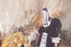 Rating: Safe Score: 0 Tags: 1girl black_dress dress frills indoors long_hair long_sleeves profile solo standing suigintou very_long_hair white_hair User: admin