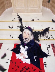 Rating: Safe Score: 0 Tags: 1girl bird black_feathers black_wings blurry crow depth_of_field dress feathers from_above long_sleeves looking_at_viewer musical_note silver_hair solo suigintou wings User: admin