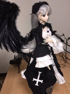 Rating: Safe Score: 0 Tags: 1girl bangs black_wings choker doll dress frills gothic_lolita lolita_fashion long_hair long_sleeves nail_polish silver_hair solo standing suigintou wings User: admin