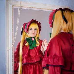 Rating: Safe Score: 0 Tags: 1girl bangs blonde_hair blue_eyes bonnet bow bowtie dress flower green_bow green_neckwear hair_ribbon long_hair long_sleeves looking_at_viewer mirror photo red_dress reflection ribbon shinku solo User: admin