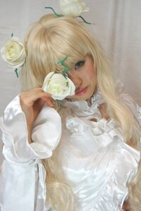 Rating: Safe Score: 0 Tags: 1girl bangs blonde_hair blue_eyes blurry dress flower kirakishou lips long_hair rose solo white_flower white_rose User: admin