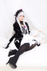 Rating: Safe Score: 0 Tags: 1girl black_footwear boots dress frills hairband high_heel_boots high_heels lips long_hair long_sleeves looking_at_viewer pantyhose silver_hair sitting solo suigintou User: admin