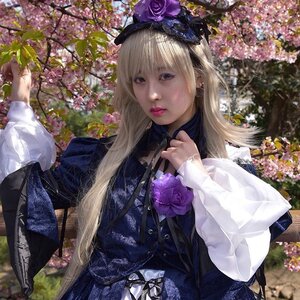 Rating: Safe Score: 0 Tags: 1girl bangs blonde_hair dress earrings flower jewelry lips long_hair long_sleeves looking_at_viewer outdoors purple_flower realistic solo suigintou User: admin