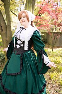 Rating: Safe Score: 0 Tags: 1girl brown_hair dress frills green_dress head_scarf long_hair long_sleeves outdoors solo standing suiseiseki tree User: admin