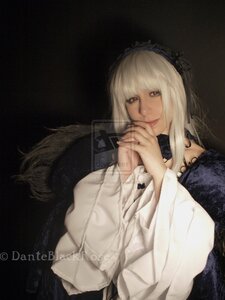 Rating: Safe Score: 0 Tags: 1girl bangs black_background closed_mouth dress hairband lace lips long_hair long_sleeves looking_at_viewer own_hands_together solo suigintou upper_body User: admin