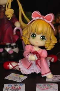 Rating: Safe Score: 0 Tags: 1girl blonde_hair blurry blurry_foreground bow card depth_of_field doll dress drill_hair figure frills green_eyes hair_bow hina_ichigo looking_at_viewer motion_blur multiple_dolls multiple_girls photo pink_bow pink_dress solo tagme User: admin