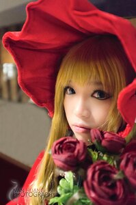 Rating: Safe Score: 0 Tags: 1girl blonde_hair blue_eyes blurry bow close-up depth_of_field face flower lips long_hair looking_at_viewer photo portrait red_flower red_rose rose shinku signature solo User: admin