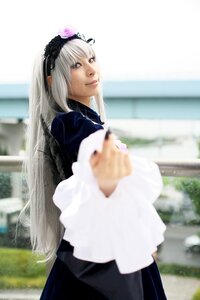 Rating: Safe Score: 0 Tags: 1girl blurry blurry_background blurry_foreground depth_of_field flower hairband long_hair looking_at_viewer photo silver_hair solo suigintou User: admin