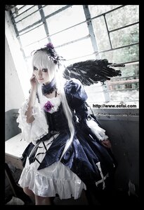 Rating: Safe Score: 0 Tags: 1girl black_border border dress feathers flower frills gothic_lolita letterboxed lips lolita_fashion rose solo suigintou wings User: admin