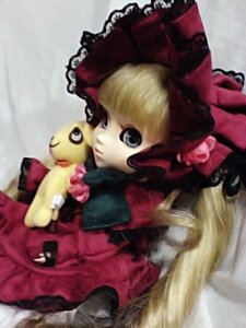 Rating: Safe Score: 0 Tags: 1girl blonde_hair blue_eyes blurry bow doll dress frills hair_bow long_hair looking_at_viewer red_dress shinku sitting solo stuffed_animal User: admin