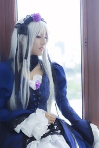 Rating: Safe Score: 0 Tags: 1girl curtains dress flower frills hair_flower hair_ornament lips long_hair long_sleeves sitting solo suigintou very_long_hair white_hair window User: admin