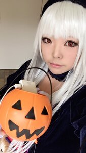 Rating: Safe Score: 0 Tags: 1girl bangs choker closed_mouth hairband halloween jack-o'-lantern lips long_hair looking_at_viewer pumpkin red_eyes solo suigintou white_hair User: admin