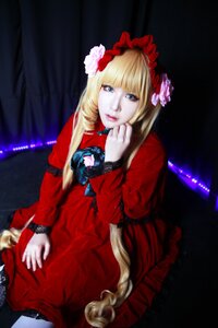 Rating: Safe Score: 0 Tags: 1girl blonde_hair blue_eyes dress flower frills lips long_hair realistic red_dress rose shinku sitting solo User: admin