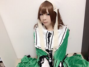 Rating: Safe Score: 0 Tags: 1girl bangs brown_hair dress frills green_dress lips long_hair photo sitting solo suiseiseki User: admin