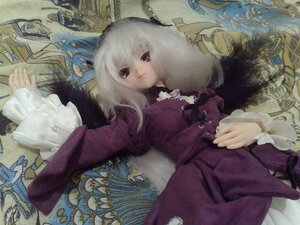 Rating: Safe Score: 0 Tags: 1girl doll dress frills long_sleeves looking_at_viewer lying on_back purple_dress red_eyes solo suigintou traditional_media white_hair wide_sleeves User: admin