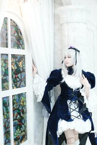 Rating: Safe Score: 0 Tags: 1girl dress frills gothic_lolita hairband lolita_fashion long_sleeves photo solo standing suigintou User: admin