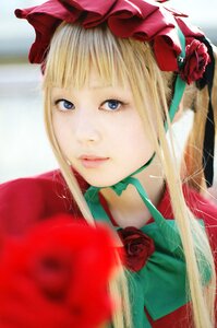 Rating: Safe Score: 0 Tags: 1girl blonde_hair blue_eyes blurry bow choker depth_of_field flower lips long_hair looking_at_viewer portrait red_flower red_rose rose shinku solo User: admin
