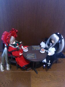 Rating: Safe Score: 0 Tags: 2girls chair cup doll dress hat long_hair multiple_dolls multiple_girls shinku silver_hair sitting table tagme teacup twintails User: admin
