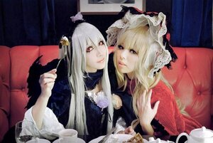 Rating: Safe Score: 0 Tags: 2girls blonde_hair blue_eyes couch dress flower hair_ornament lips long_hair looking_at_viewer multiple_cosplay multiple_girls suigintou tagme upper_body User: admin