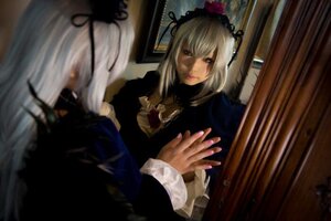 Rating: Safe Score: 0 Tags: 1girl bangs blurry closed_mouth depth_of_field dress flower lips long_sleeves mirror silver_hair solo suigintou User: admin