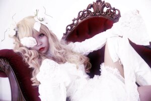 Rating: Safe Score: 0 Tags: 1girl blonde_hair flower hair_flower hair_ornament kirakishou lace lips long_hair makeup sitting solo User: admin