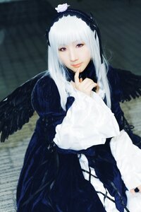 Rating: Safe Score: 0 Tags: 1girl bangs black_wings blurry closed_mouth doll_joints dress finger_to_mouth hairband long_hair long_sleeves looking_at_viewer purple_eyes solo suigintou wings User: admin