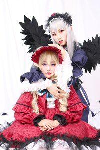 Rating: Safe Score: 0 Tags: 2girls blonde_hair blue_eyes bonnet dress feathers frills hat lace lips long_hair multiple_cosplay multiple_girls red_eyes shinku silver_hair suigintou tagme User: admin